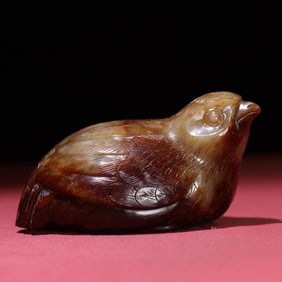 A jade carving quail handle piece from the Warring Han Dynasty