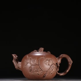A chocolate squirrel grape pot