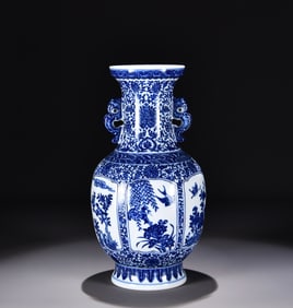 A Qing Qianlong blue and white entwined branch consecrated flower and bird picture amphora