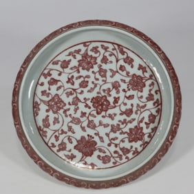 A Qing Dynasty glazed red entwined flower brush wash