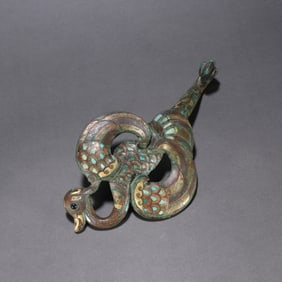 A bronze file, gold and silver inlaid with turquoise phoenix pattern with hooks