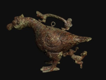 A Shang and Zhou bronze bird beam pot