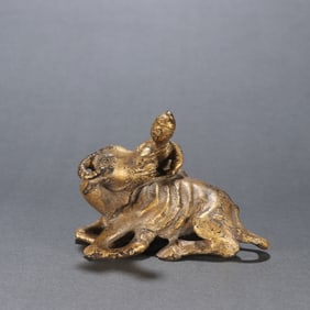 A piece of Qing copper gilt boy cow herding paperweight