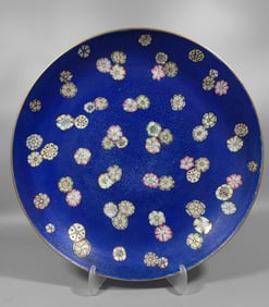 A Qing Dynasty leather ball plate