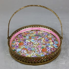 A pastel kaleidoscope copper fruit plate