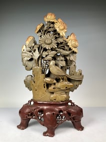 A Qingtian stone carved flower and bird ornament