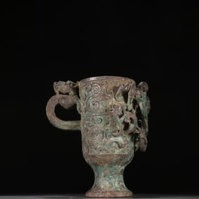 A Qing Dynasty sterling silver dragon pattern cup