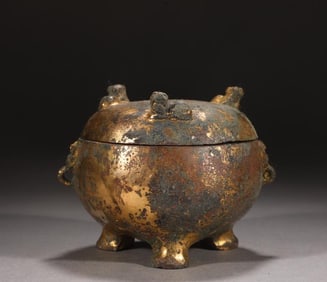 A Han Dynasty bronze gilt shop with the first title Huan Dun