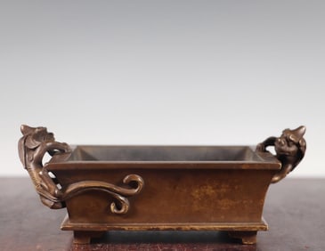 A bronze dragon incense burner from the Qing Dynasty