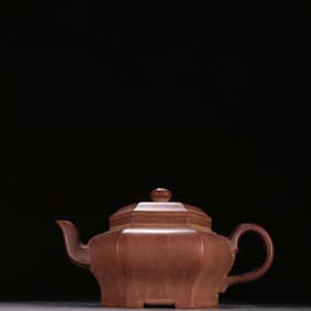 A Qing Dynasty Qianlong purple sand hexagonal teapot