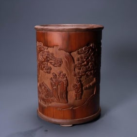 A Qing Dynasty bamboo carved character story pen holder