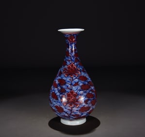 A Yuan Dynasty blue and white glazed red jade pot spring