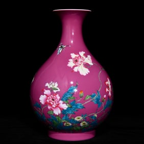 A Qing Yongzheng carmine pastel flower butterfly pattern jade pot spring vase
