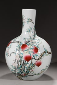 A Qing Qianlong pastel nine peach heavenly ball bottle