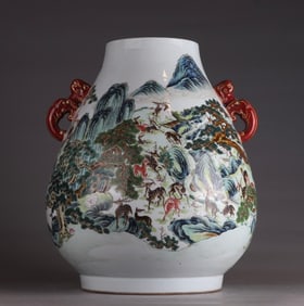 A Qing Qianlong pastel hundred deer statue