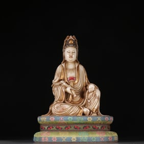 A hibiscus stone Guanyin statue