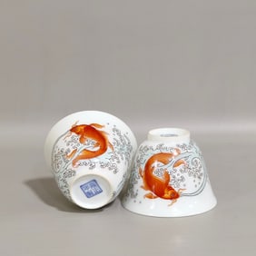 A pair of Qing Yongzheng enamel colors like a fish in a water cup