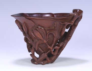 A Qing Dynasty Huanghuali orchid cup