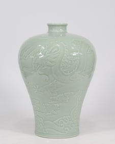 A bean blue glaze carved Canglong godson plum bottle made in the Qianlong period of the Qing Dynasty