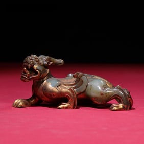 A jade-gilt beast ornament of the Han Dynasty