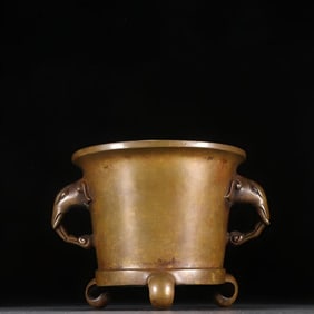 A Ming Xuande three-legged incense burner