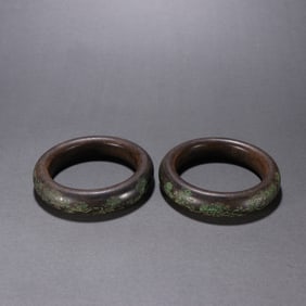 A pair of agarwood carved bracelets
