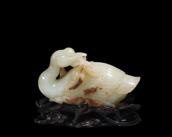 A Qing Dynasty lotus pond mother goose holding a wheat ear ornament