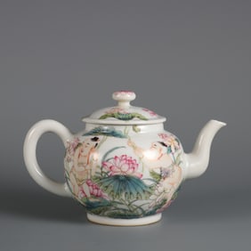 A pastel baby play lotus pattern teapot made in the Qing Dynasty