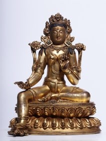 A seated statue of Tara, a bronze gilt green Tara, from the Qing Dynasty