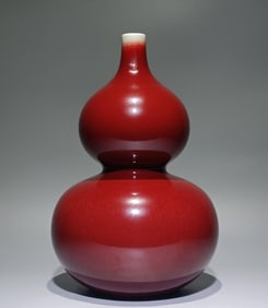 A Qing Yongzheng Lang red glazed gourd bottle