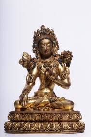 A seated statue of Tara in copper gilt from the Qing Dynasty