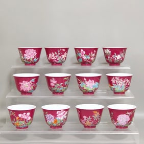 A Qing Dynasty Yongzheng enamel carmine cup painted with twelve flower gods