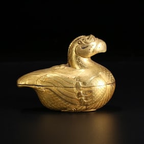 A Song Dynasty style copper gilt mandarin duck lid box