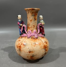 A Qianlong year stone pattern boy playing flower belt bottle