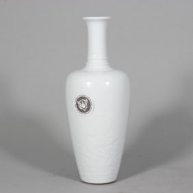 A piece of Qing Kangxi sweet white glazed seawater dragon pattern Lai Raizun
