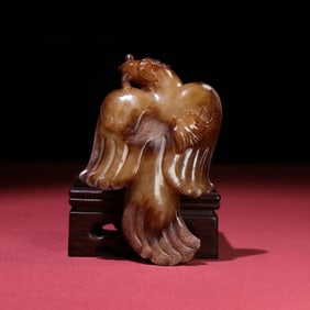 A Han Dynasty Manqin phoenix bird handle