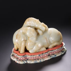 A Hetian jade carved double horse ornament