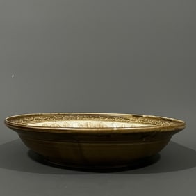 A large plate of a Song Ding kiln brown color flower deflorated Buddha statue