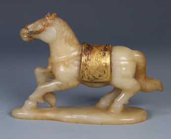 A Liao gold Hetian jade-wrapped copper gilt horse ornament