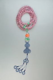 A piece of court bead string tourmaline 108 Buddha beads held