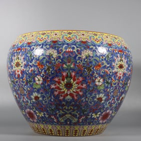 A Qing Qianlong pastel blue ground entangled lotus eight-treasure pattern jar