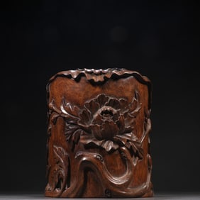 A pen holder with an agarwood pattern