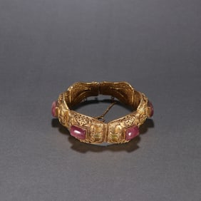 A Qing silver gilt tourmaline manual transmission
