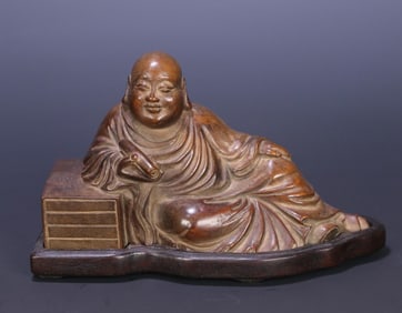 A Qing Dynasty sandalwood arhat ornament