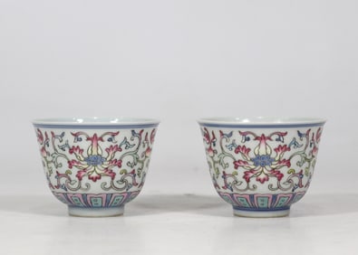 A pair of pastel entwined flower cups made in the Qing Yongzheng year