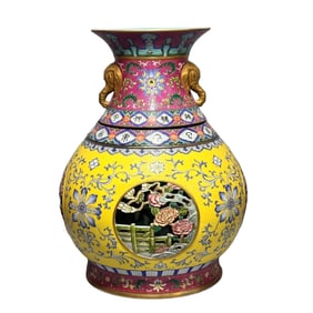 A Qianlong era of the Qing Dynasty enamel color entwined floral pattern hollow heart vase