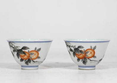 A pair of Qing Yongzheng year ink color alum red everything wishful cups