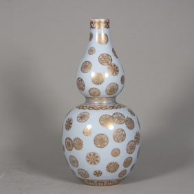 A Qing Kangxi sky blue glaze gold-painted leather ball flower gourd bottle