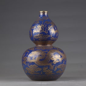 A Qing Qianlong blue gold-painted dragon pattern gourd bottle