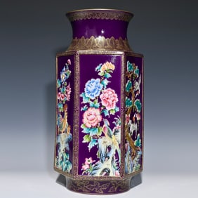 A Qing Qianlong eggplant skin purple glaze relief pastel flower and bird pattern hexagonal bottle